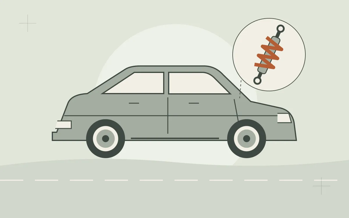 Ilustrasi kereta dengan paparan dekat penyerap hentak dan spring suspensi.